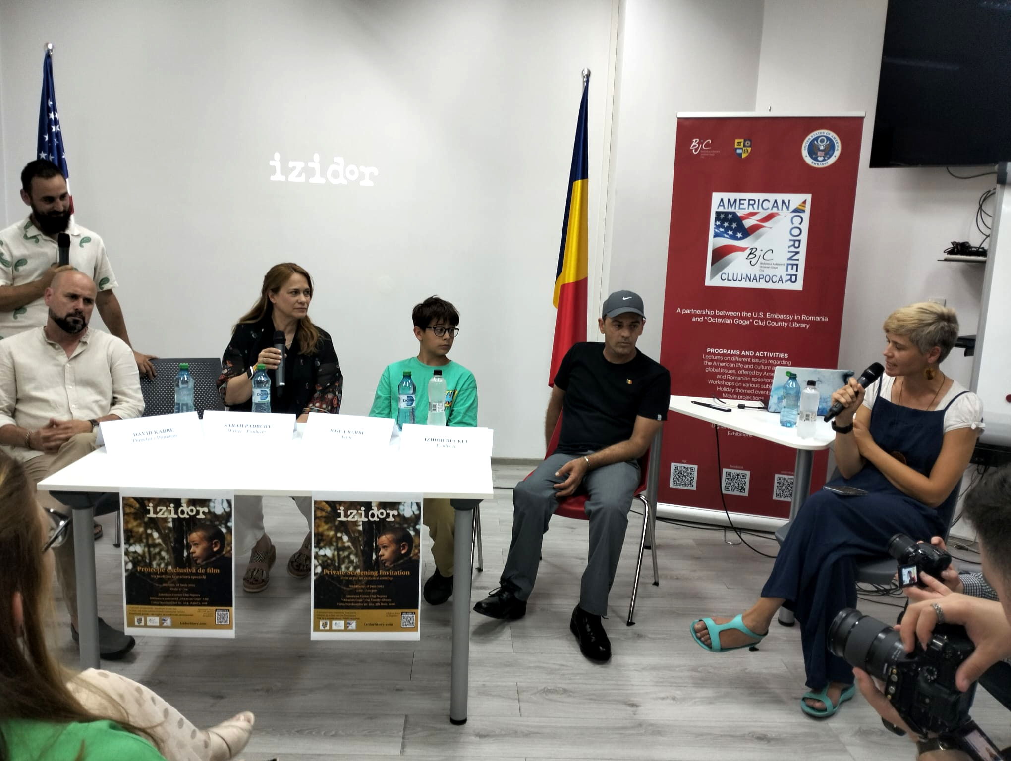 Izidor, attending the screening of the film that bears his name, talks with young audience members about what could be done to improve the lives of institutionalized children around the world